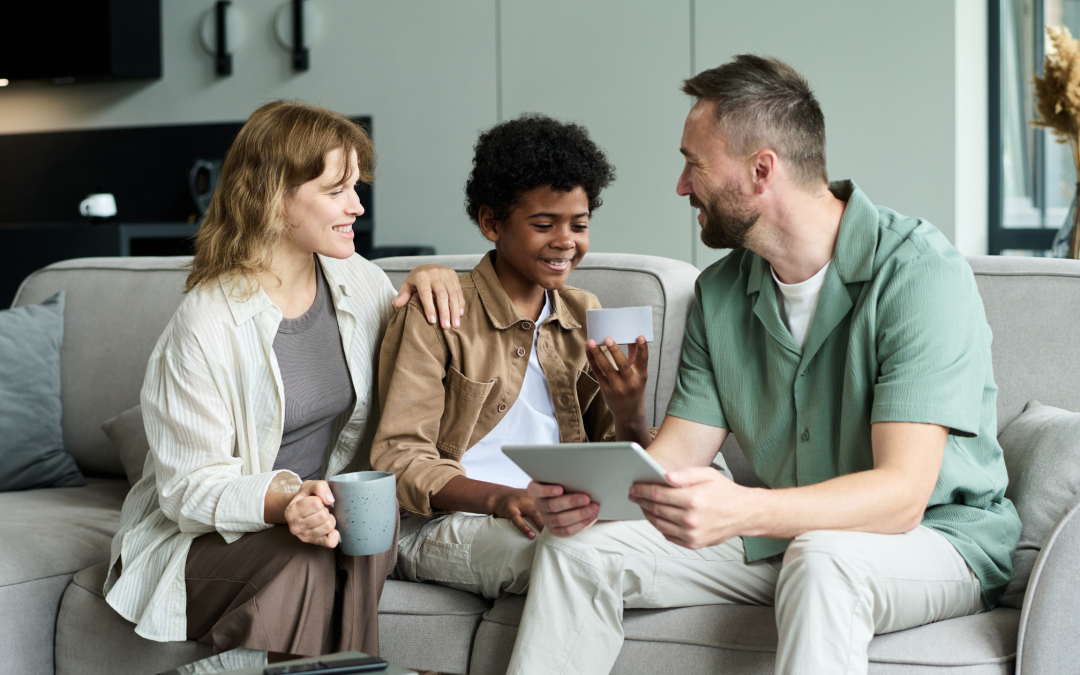 Family navigating contact in adoption while sitting on a couch